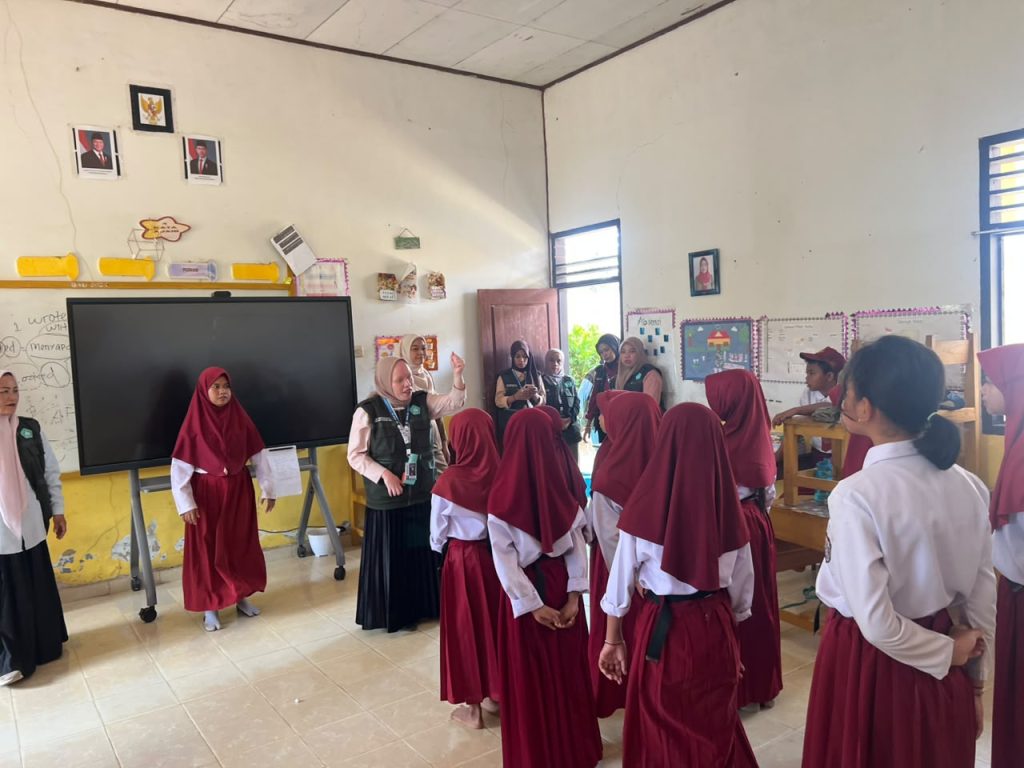 Posko 5KKA, Kegiat an Melatih Paduan Suara SD 10 Wawonggura