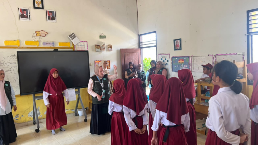 Posko 5KKA, Kegiat an Melatih Paduan Suara SD 10 Wawonggura